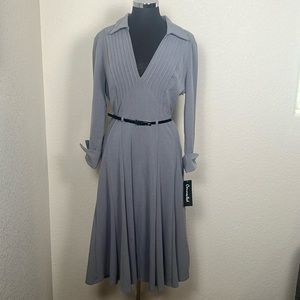 This is a grey vintage one of a kind 1940’s dress that can’t be found anywhere!